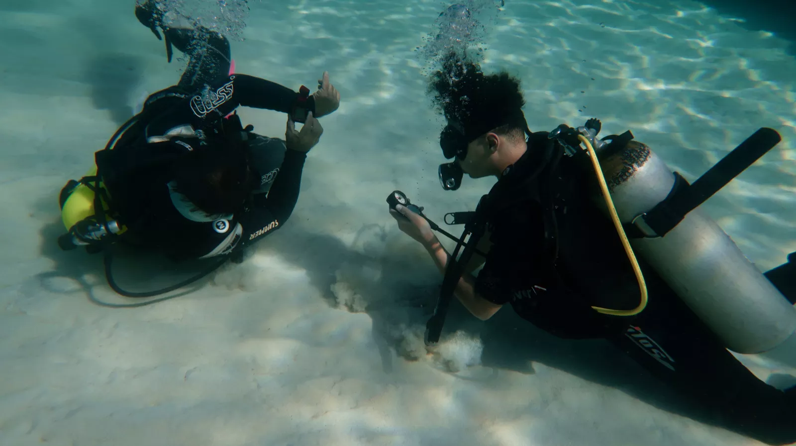 Scuba instructor teaching beginners at Playa Coral Cuba